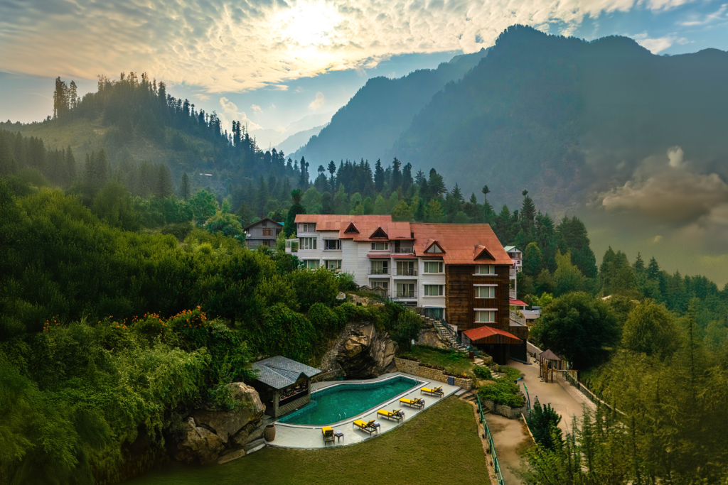 Luxurious stay at Bookmark Resorts, Manali surrounded by mountains and lush greenery