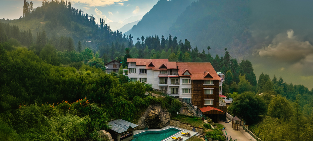 Luxurious stay at Bookmark Resorts, Manali surrounded by mountains and lush greenery